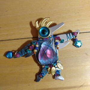 Liztech Multicolor bird brooch.